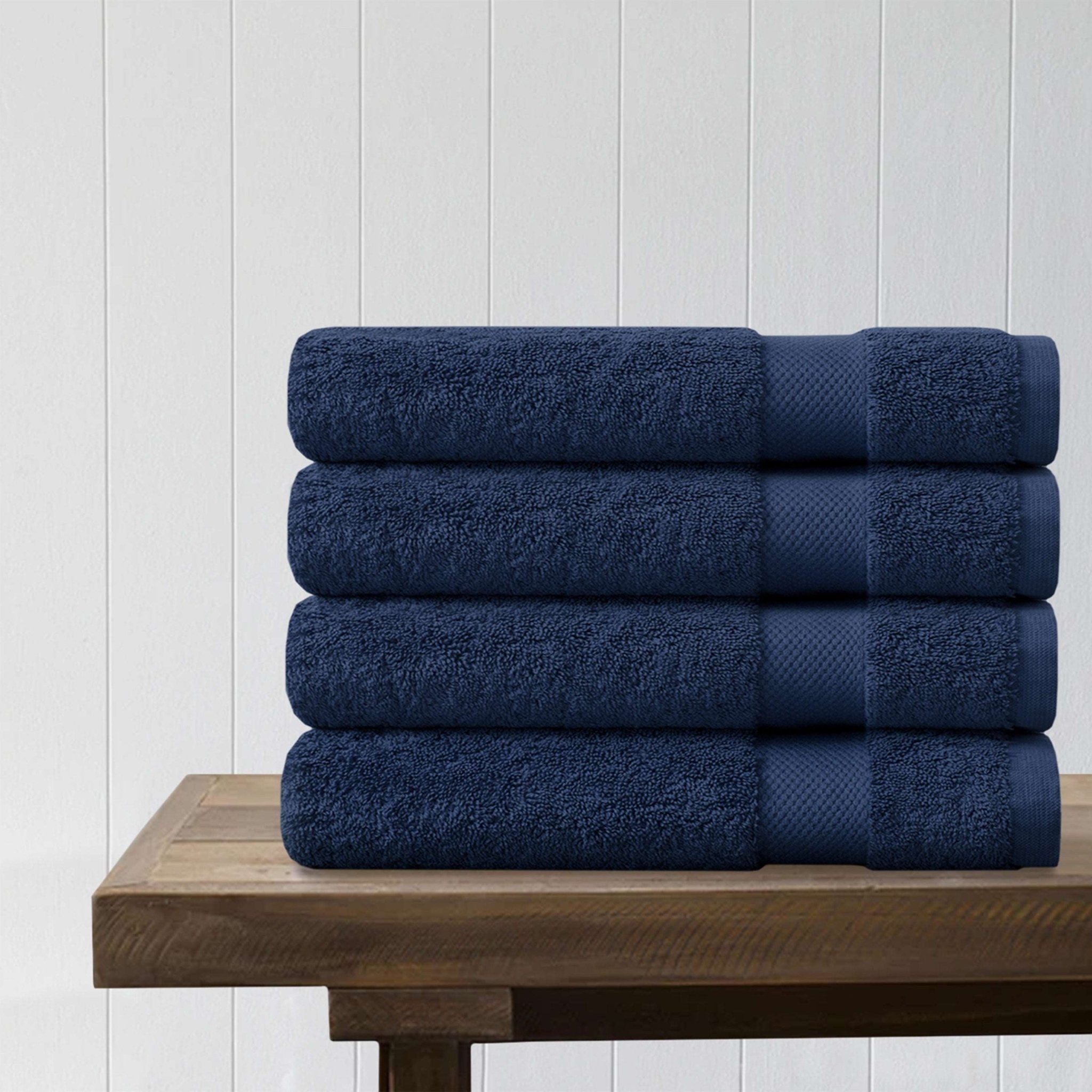 http://www.delarahome.com/cdn/shop/products/100-organic-cotton-quick-dry-bath-towel-navy-blue-pack-of-4-339190.jpg?v=1703148357