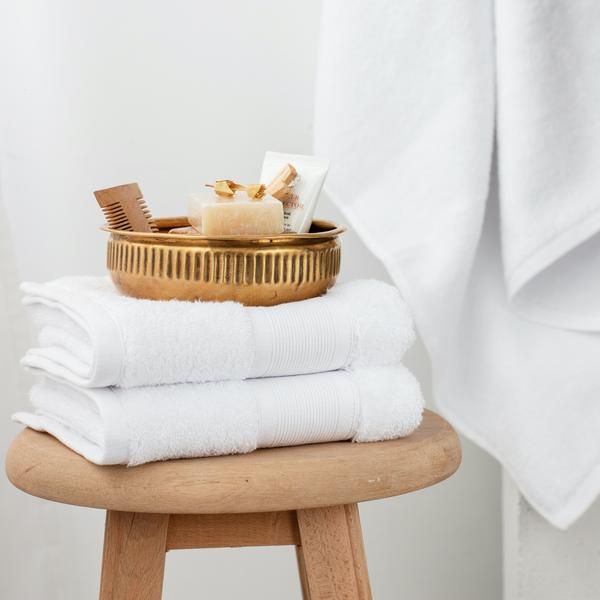 https://www.delarahome.com/cdn/shop/articles/True_Luxury__Bathroom_Towels_1-402949.jpg?v=1703148765