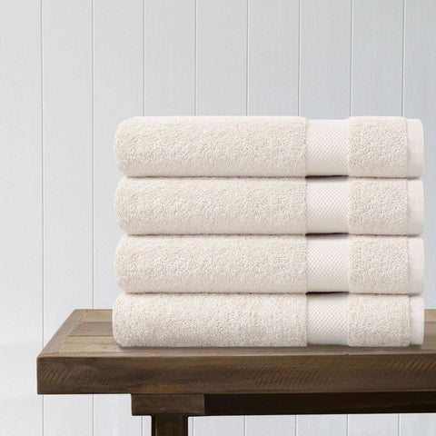 https://www.delarahome.com/cdn/shop/products/100-organic-cotton-quick-dry-bath-towel-ivory-pack-of-4-808126.jpg?v=1703148357&width=480